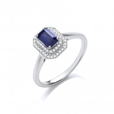 9ct White Gold 0.70ct Emerald Cut Sapphire & 0.10ct Diamond Double Halo Ring